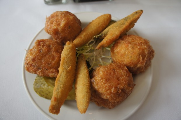 Fried and battered fish hush puppies and anchovies