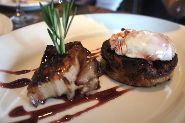 Baked Spanish Toast - cinnamon baked bread pudding topped with Bordeaux cherries, kalimotxo glazed pork belly, and poached egg - the dish was subtly sweet and savory, kalimotxo is a signature Basque style made by marinating the meat with cola and wine. $14