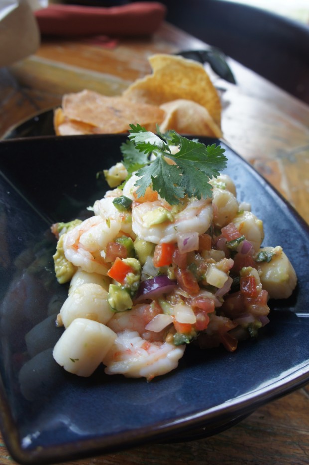 "Ceviche Del Dia" is made Fresh daily with Marinated seafood with lime, onion, tomato, cilantro, avocado and pepper
