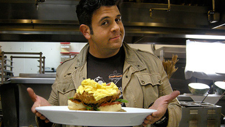 Adam Richman of the Travel Channel's Man Vs. Food with the Fried Chicken Eggs Benedict