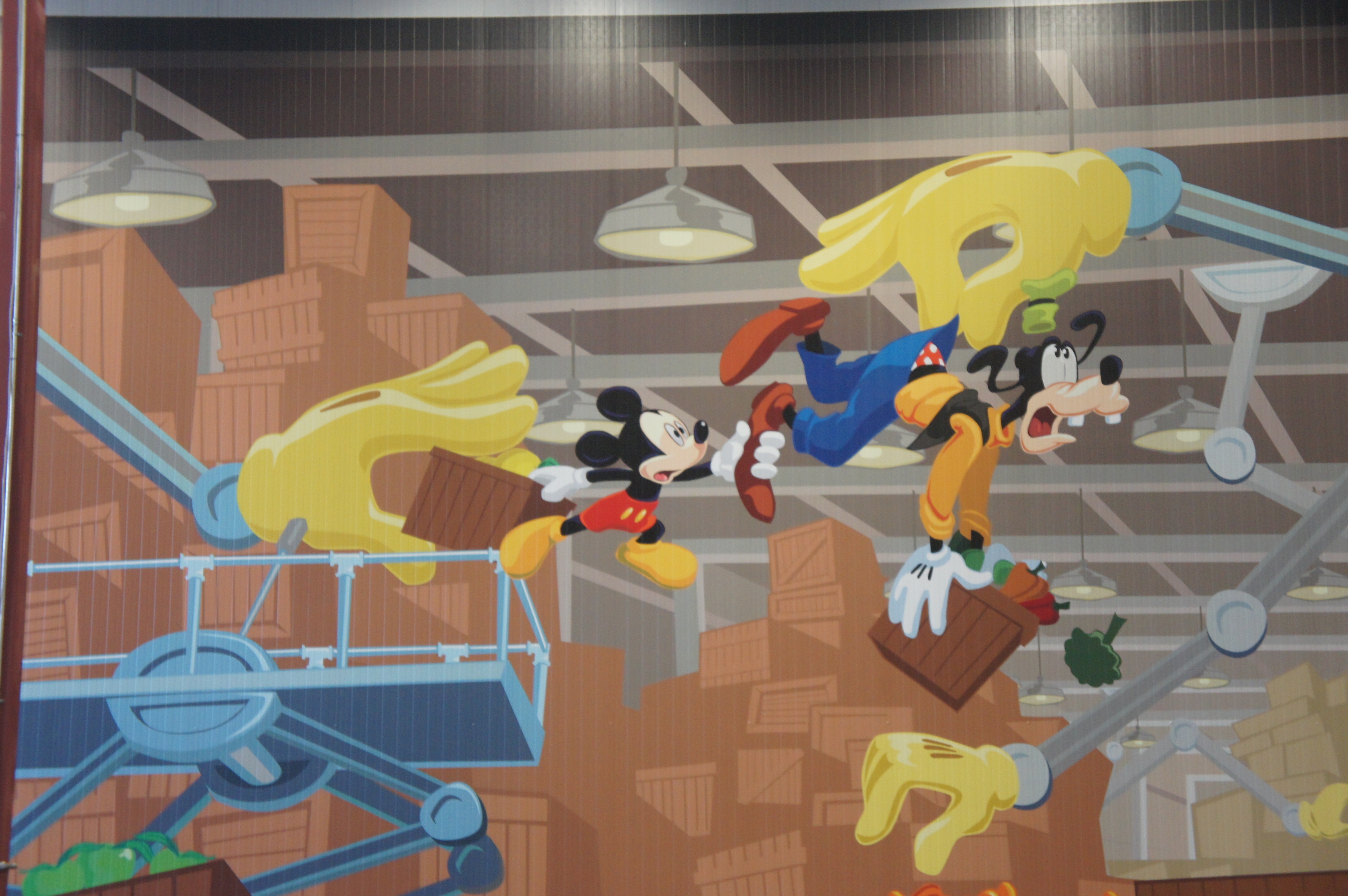 Disney Imagineers paint this scene w Mickey and Goofy at Second Harvest Food Bank