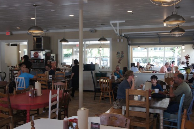 Interior of The Coop - mismatched chairs and tables, family settings...