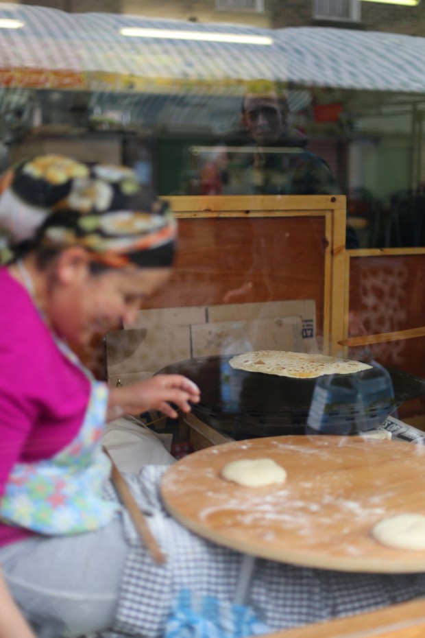 A Turkish lady making gozlenes, kind of a Turkish roti stuffed with cheese and spinach