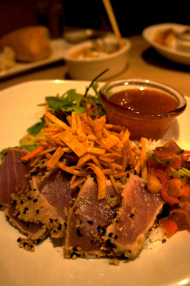 Spicy Tuna Bowl – premium sushi grade, sesame-seared rare tuna served with avocado, sweet chile sauce, jasmine rice and passion fruit salsa