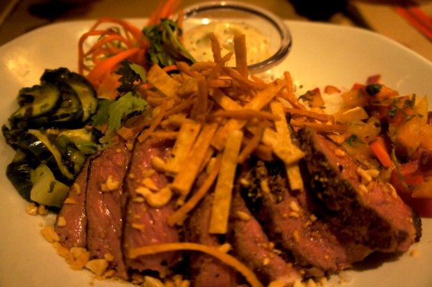 Seared NY Strip Bowl – USDA Choice NY Strip seared to your preference served with marinated cucumbers, roasted peanuts and passion fruit salsa, jasmine rice and a black pepper aioli