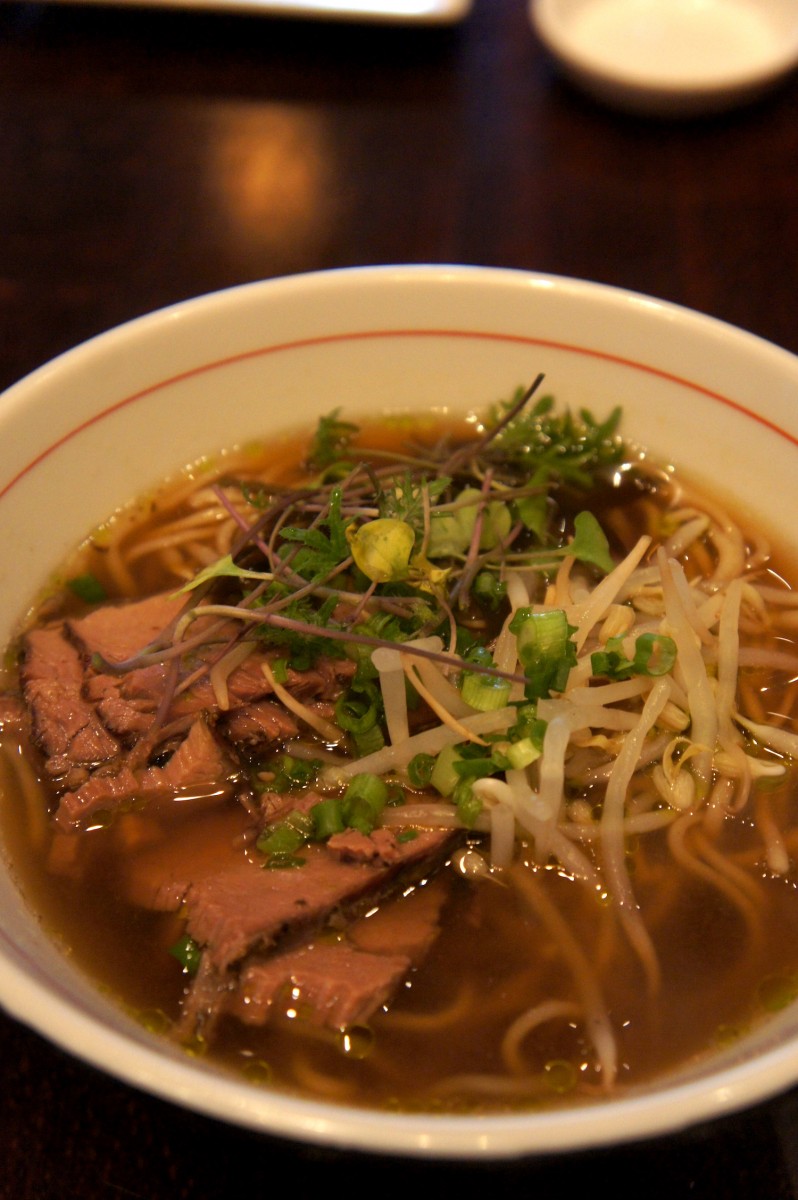 The gyu ramen, beef pho based broth with cilantro oil, beef brisket, and sprouts