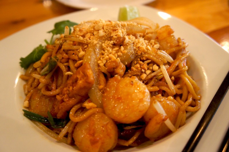 Char Kway Teow -Malaysia's most popular street dish, wok-fried rice noodles, with shrimp, chicken, eggs, bean sprouts, and chives.