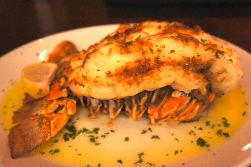 Broiled Lobster Tail Carved tableside & served with drawn butter & lemon. 