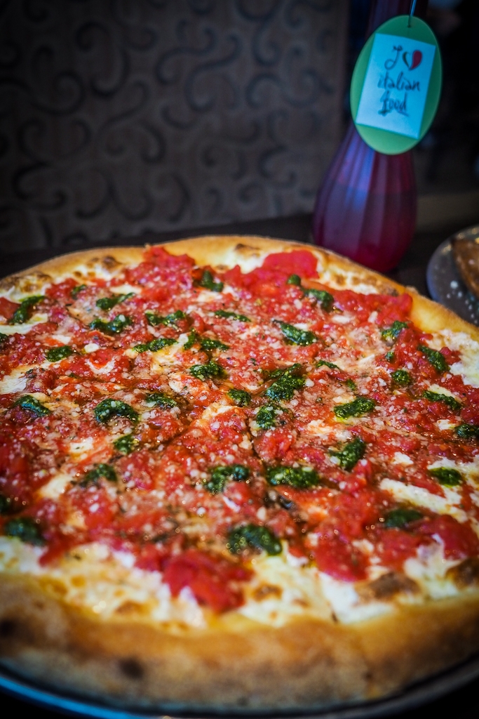 Vinzo's Italian Classic Pizza - Plum tomatoes, pesto sauce, Parmesan and mozzarella cheese